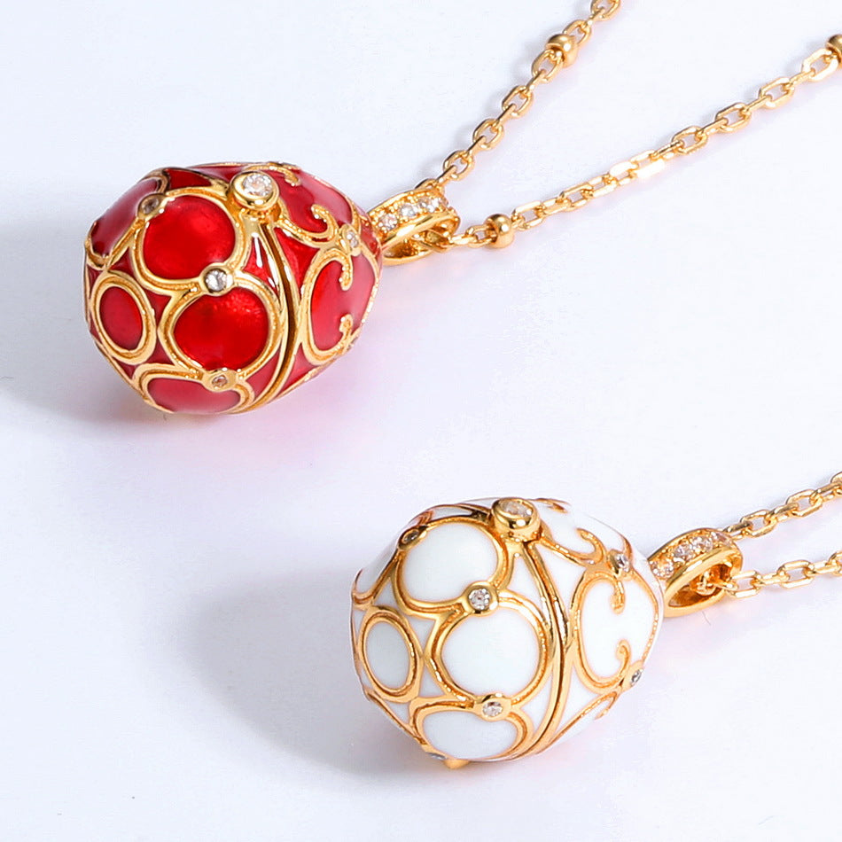 S925 Sterling Silver Plated 9K Gold Dripping Pattern White Zirconium Egg Necklace