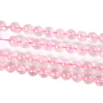 Round rose quartz with a straight hole