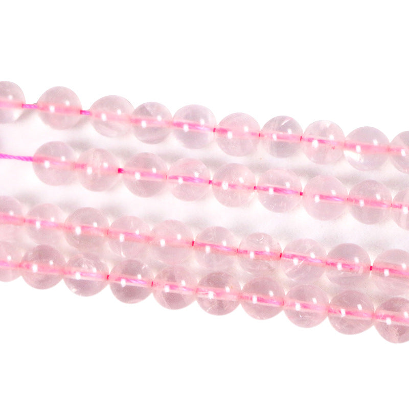 Round rose quartz with a straight hole