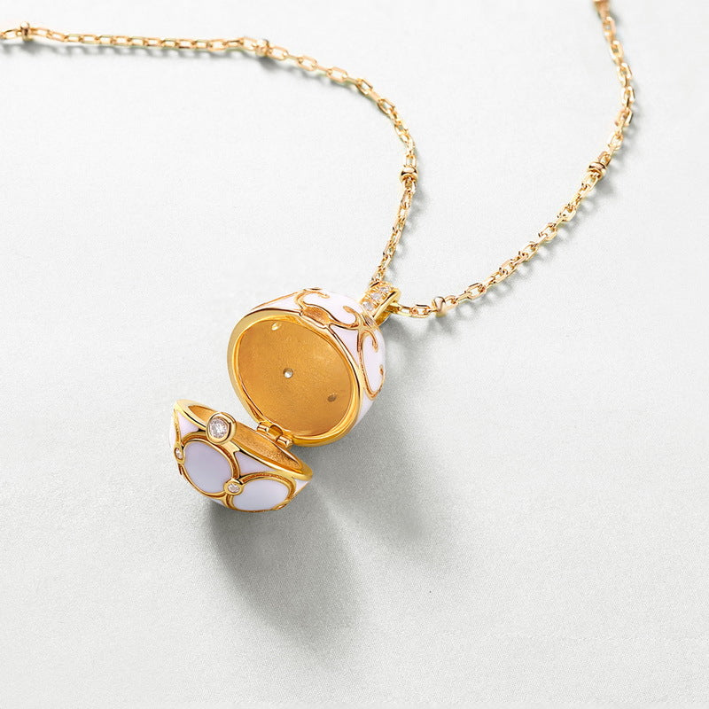 S925 Sterling Silver Plated 9K Gold Dripping Pattern White Zirconium Egg Necklace
