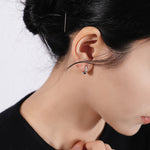 925 Sterling Silver Twisted Polished Huggie Earrings