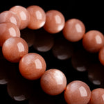 Natural Orange Moonstone Round Bead Crystal Bracelet