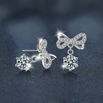 Stylish and elegant moissanite earrings with a bow design in 925 sterling silver