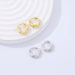 925 Sterling Silver Twisted Polished Huggie Earrings
