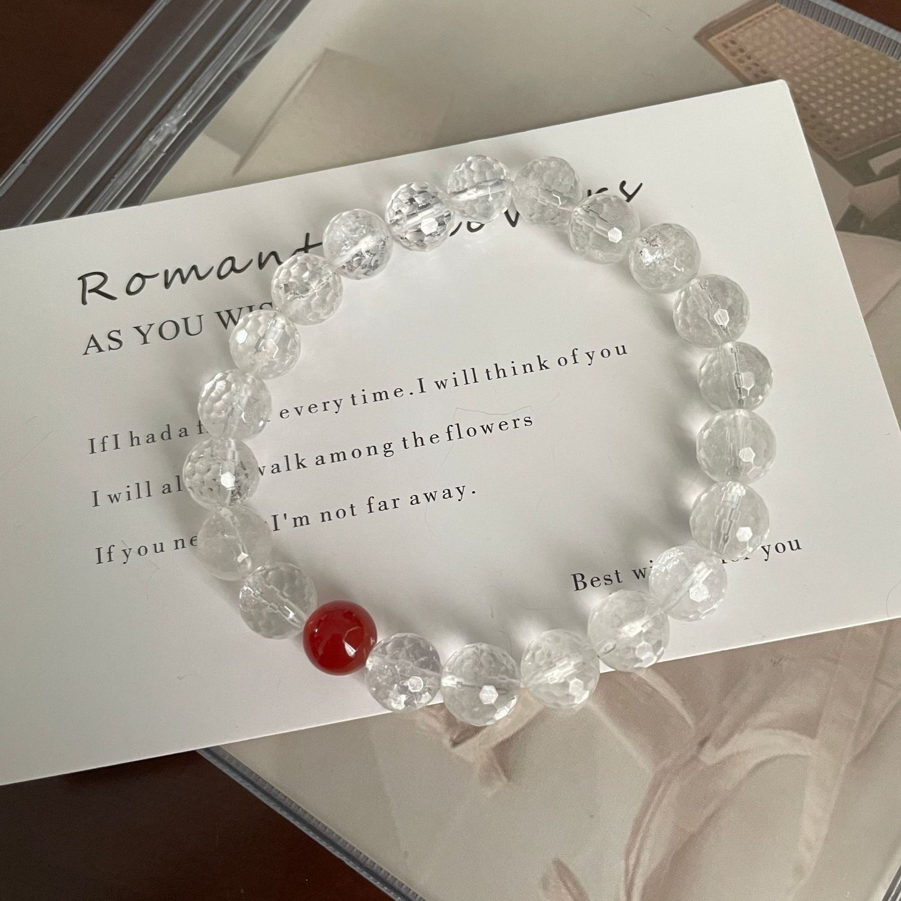 Cut white crystal beaded red agate bracelet