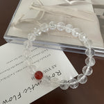 Cut white crystal beaded red agate bracelet