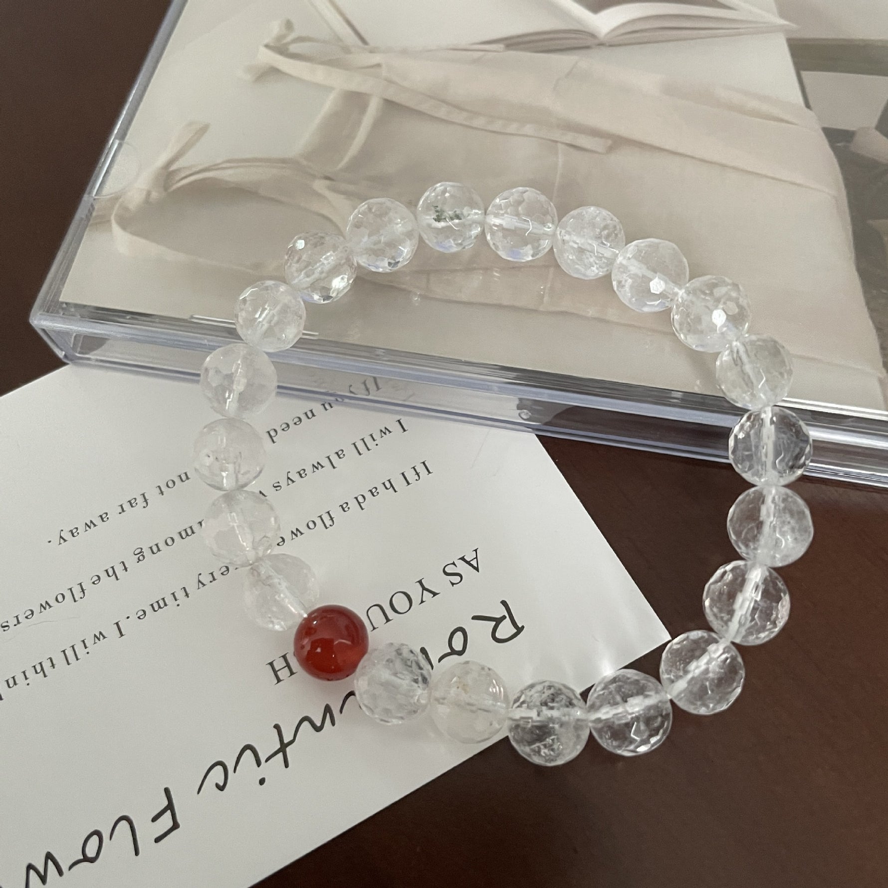 Cut white crystal beaded red agate bracelet