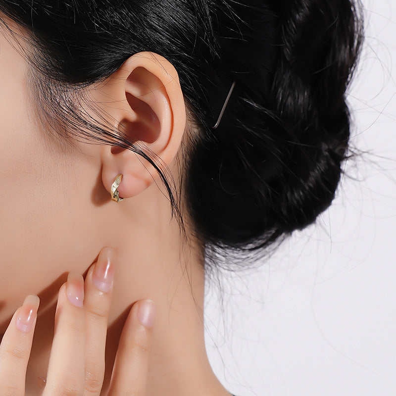 925 Sterling Silver Twisted Polished Huggie Earrings