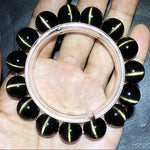 Natural Golden Obsidian Bracelet with Cat's Eye Effect and "Single-Line" Pattern