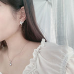 Exquisite 925 sterling silver moissanite bow earrings