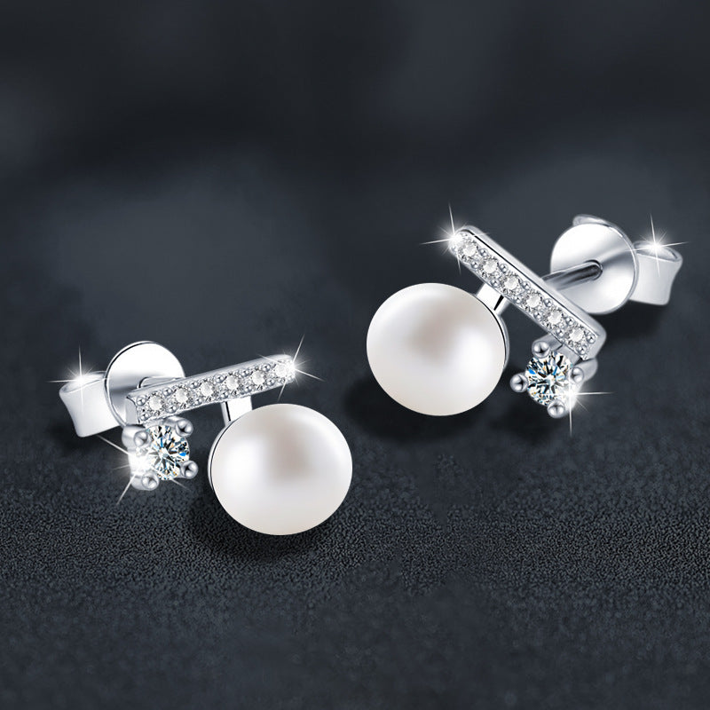 925 silver "balance beam" earrings, set with freshwater pearls and moissanite.