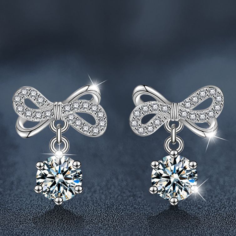 Stylish and elegant moissanite earrings with a bow design in 925 sterling silver